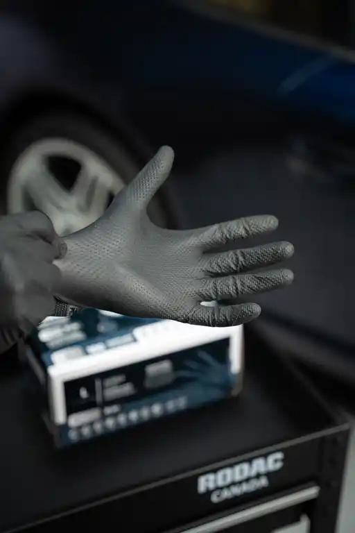Industrial grade nitrile gloves with textured fingertips Black 8 Mil XX-Large (100 per Box)